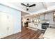 Open-concept kitchen with granite counters and stainless appliances flows into living room at 764 E 42Nd St, Indianapolis, IN 46205