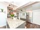 Modern kitchen with stainless steel appliances, granite countertops, and ample cabinet space at 764 E 42Nd St, Indianapolis, IN 46205
