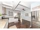 Bright kitchen with stainless appliances, granite countertops, and stylish shelving at 764 E 42Nd St, Indianapolis, IN 46205