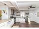 Bright kitchen with stainless appliances, granite countertops, and stylish shelving at 764 E 42Nd St, Indianapolis, IN 46205