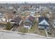 Aerial view of neighborhood, city skyline in the background at 832 N Parker Ave, Indianapolis, IN 46201