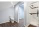 Bright bathroom with a glass-enclosed shower and tile flooring at 832 N Parker Ave, Indianapolis, IN 46201