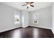 Bright bedroom with two windows, hardwood floors, and neutral decor at 832 N Parker Ave, Indianapolis, IN 46201