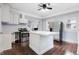 Bright kitchen features updated cabinets, stainless steel appliances, and a marble-topped center island at 832 N Parker Ave, Indianapolis, IN 46201