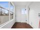 Sunroom with many windows and a door to the outside at 832 N Parker Ave, Indianapolis, IN 46201
