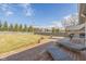 Large backyard with an expansive wooden deck, perfect for outdoor entertaining and relaxation at 9046 Pinecreek Ct, Indianapolis, IN 46256