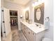 Bright bathroom with double sinks, and walk-in closet with ample storage at 9748 Junction Station, Fishers, IN 46037