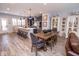 Spacious open floor plan includes kitchen island and dining room, plus a large island with counter seating at 9748 Junction Station, Fishers, IN 46037