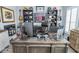 Functional home office featuring a large desk, comfortable chair, and sports memorabilia on display at 9748 Junction Station, Fishers, IN 46037