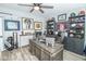 Well-equipped home office with a large desk, sports decor, and built-in storage shelves at 9748 Junction Station, Fishers, IN 46037