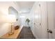 Entryway featuring a table, mirror, and a plant, creating a welcoming space at 9858 Oakmont E Dr, Pendleton, IN 46064