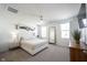 Bright main bedroom featuring neutral carpet, fresh paint, and modern furnishings at 9858 Oakmont E Dr, Pendleton, IN 46064