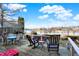 Back deck overlooking the lake with seating area at 9970 Southwind Dr, Indianapolis, IN 46256