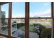 Backyard views from a window with a water view, patio, and outdoor seating area at 9970 Southwind Dr, Indianapolis, IN 46256
