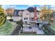 Two story exterior back of home with outdoor space on a sunny day at 9970 Southwind Dr, Indianapolis, IN 46256
