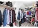 Organized walk-in closet with ample storage space, shelves, and hanging rods for clothing and accessories at 9970 Southwind Dr, Indianapolis, IN 46256