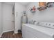 Functional laundry room with a washer, dryer, and water heater at 1051 Macoun Dr, Westfield, IN 46074