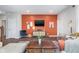 Cozy living room with stylish decor, featuring a modern TV and a comfortable seating area with hardwood floors at 1051 Macoun Dr, Westfield, IN 46074