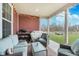 Relaxing covered patio with comfortable seating and grill area, perfect for outdoor entertaining at 1051 Macoun Dr, Westfield, IN 46074