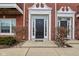 Inviting entryway to brick townhome at 1072 3Rd Nw Ave, Carmel, IN 46032