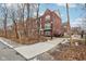 Brick multi-Gathering townhome with multi-car garages and landscaped entrance at 1072 3Rd Nw Ave, Carmel, IN 46032