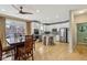 Modern kitchen featuring stainless steel appliances and breakfast bar at 1072 3Rd Nw Ave, Carmel, IN 46032