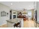 Open concept kitchen and living space with fireplace and decor at 1072 3Rd Nw Ave, Carmel, IN 46032