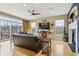 Bright living room featuring hardwood floors, fireplace, and sliding glass doors to balcony at 1072 3Rd Nw Ave, Carmel, IN 46032