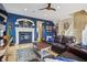 Elegant living room with fireplace, staircase and hardwood floors at 1072 3Rd Nw Ave, Carmel, IN 46032