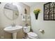 Well-lit powder room with modern fixtures and elegant decor at 1072 3Rd Nw Ave, Carmel, IN 46032