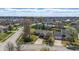 Aerial view of a neighborhood showcasing the home's location and surrounding mature trees at 12205 Whitebark Dr, Indianapolis, IN 46236