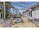 Entertain outdoors on this spacious deck featuring comfortable seating and a charming pergola at 12205 Whitebark Dr, Indianapolis, IN 46236