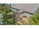Backyard deck with pergola and patio seating surrounded by mature trees for privacy and outdoor living at 12205 Whitebark Dr, Indianapolis, IN 46236