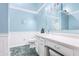 Bathroom with vanity, mirror, toilet, and green and white color scheme at 12205 Whitebark Dr, Indianapolis, IN 46236