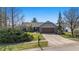 Charming ranch home featuring a brick facade, well-manicured lawn, and an attached two-car garage at 12205 Whitebark Dr, Indianapolis, IN 46236