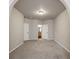 Spacious carpeted bedroom featuring two entryways at 12863 Tradd St # 1D, Carmel, IN 46032