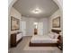 Bright main bedroom with a neutral color palette and a full ensuite bath at 12863 Tradd St # 1D, Carmel, IN 46032