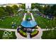 A vibrant town square with a gazebo is the site of a concert with attendees spread across the lawn at 12863 Tradd St # 1D, Carmel, IN 46032