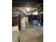 Basement with a water heater, furnace, and other utilities at 2025 Main St, Elwood, IN 46036