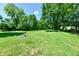 Large backyard with mature trees, and a perfect spot for a firepit at 2850 Tansel Rd, Indianapolis, IN 46234