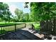 Wooden deck overlooking the lush, green backyard at 2850 Tansel Rd, Indianapolis, IN 46234