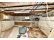 Unfinished basement shows concrete block walls, utilities and low ceilings at 2850 Tansel Rd, Indianapolis, IN 46234