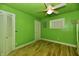 Bright bedroom with hardwood floors, white trim, and a ceiling fan, offering a comfortable living space at 2850 Tansel Rd, Indianapolis, IN 46234