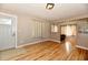 Bright living room with hardwood floors and neutral walls, featuring an open layout with natural light at 2850 Tansel Rd, Indianapolis, IN 46234