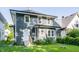 Charming two-story home with a well-maintained exterior, complemented by a neat front lawn at 3543 N Kenwood Ave, Indianapolis, IN 46208