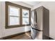 Kitchen featuring stainless steel refrigerator, neutral paint and hardwood floors at 3543 N Kenwood Ave, Indianapolis, IN 46208