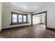 Bright living room featuring neutral paint, beautiful hardwood floors, and an open layout at 3543 N Kenwood Ave, Indianapolis, IN 46208