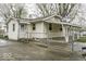 Charming single-Gathering home featuring a fenced yard, a cozy patio and private driveway at 3807 S Olney St, Indianapolis, IN 46237