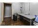 Functional office space with hardwood floors, a desk, and ample lighting, perfect for a home office at 3807 S Olney St, Indianapolis, IN 46237