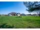 Expansive backyard with lush green lawn and a charming playset, perfect for outdoor enjoyment at 413 Cardinal Dr, Jamestown, IN 46147